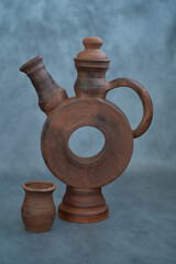 Obraz na płótnie Canvas eramics, a ceramic product made with your own hands, made on a potter's wheel, a jug, a mug, clay. 