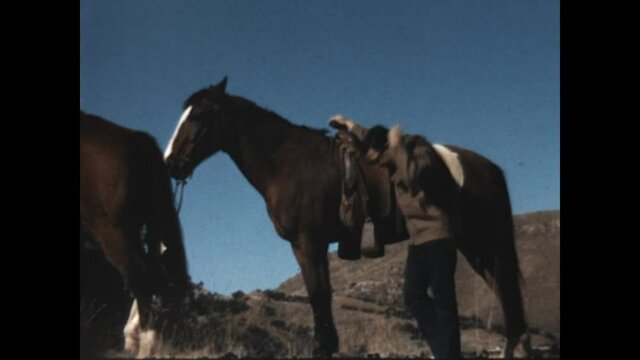 Urban Cowboy 1967 - A man checks his saddle and prepares to ride.  