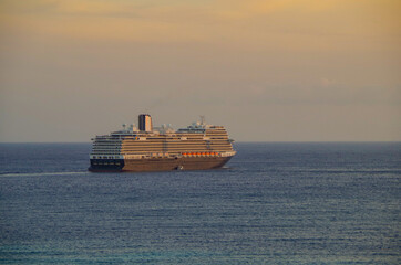 Huge modern HAL Holland America cruiseship or cruise ship liner departure from Oranjestad, Aruba...