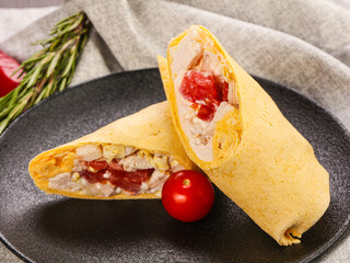 Roll with chicken and tomato