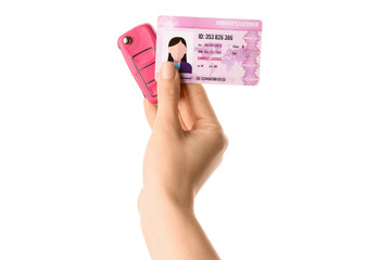 Woman with driving license and car key on white background