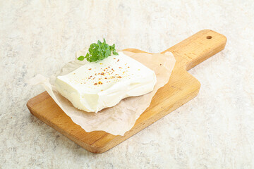 Greek Feta cheese over board