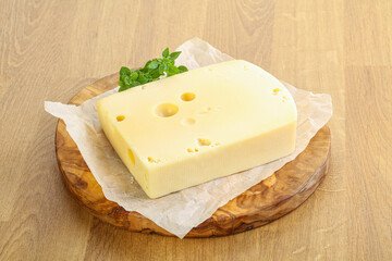 Maasdam cheese over the board