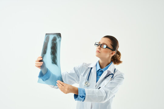 female doctor with x-ray health care isolated background