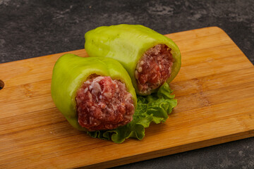 Raw stuffed pepper for cooking