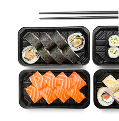 Composition with delicious sushi rolls on white background