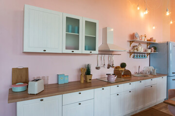 Kitchen interior with large dining table in modern apartment