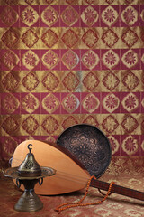 Traditional Turkish lamps, incense burner, rosary beads, national musical instrument baglama saz. symbol of Islam. still life