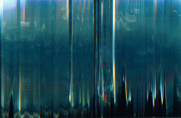 Glitch overlay. Dust scratch texture. Distressed filter. Distorted screen. Dark teal blue white black digital artifacts dirt stain old film texture abstract background.