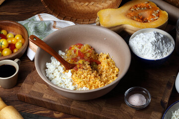 Chopped tomatoes, pumpkin and cottage cheese in a ceramic bowl