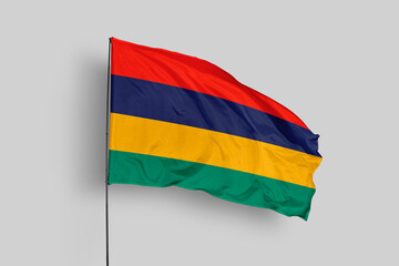 Mauritius flag isolated on the blue sky background. close up waving flag of Mauritius. flag symbols of Mauritius. Concept of Mauritius.