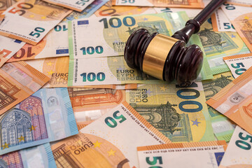 euro banknotes with judge hammer