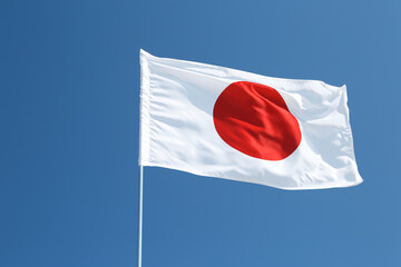 Waving flag of Japan outdoors - obrazy, fototapety, plakaty
