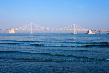 Obraz premium Gwangan bridge with beach in Busan, South Korea.