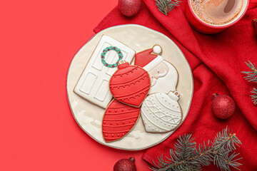 Plate with beautiful Christmas cookies on color background