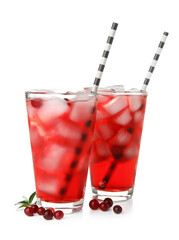 Glasses with healthy cranberry juice on white background