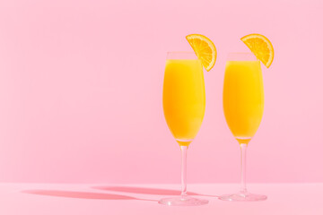 Refreshing orange Mimosa cocktails with champagne.