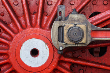 Red steam locomotive wheel