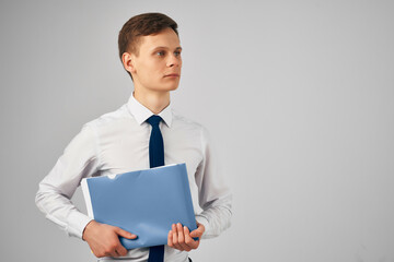 business man in shirt with tie blue folder documents work official