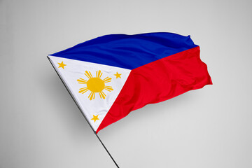 Philippines flag isolated on white background. close up waving flag of Philippines. flag symbols of Philippines. Concept of Philippines.