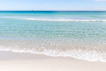 White empty beach landscape. La Cinta, San Teodoro, Sardegna, Italy. Blue sky, clouds