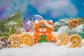 Christmas background with tiger gingerbread 2022. Holiday mood card. Family traditions, DIY,...