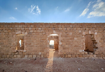 Ruins of the Ottoman railway station. Sunset time. Negev desert in Israel - obrazy, fototapety, plakaty
