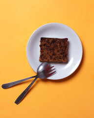 Sweet chocolate sponge for breakfast or just as a snack during the day. The sweet taste is very liked by toddlers to adults. Sponge cake has a soft texture. Cake mockup. Focus blur.