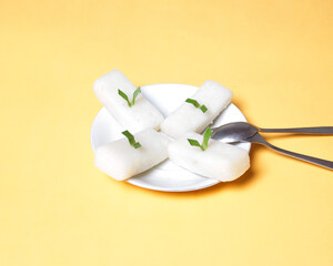 Tetel cake with a savory taste and a slightly rough texture. A traditional snack made from cassava comes from Gunung Kidul. This snack is common at large parties. Traditional snack mockup. Focus blur.