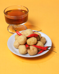 Hot round tofu for snacks in spare time. Round tofu is one type of tofu that, as the name implies, is round in shape. It has a crunchy texture on the outside and soft on the inside. Focus blur.