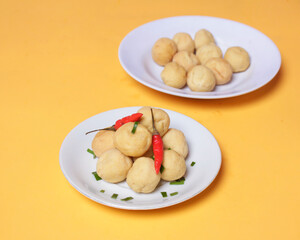 Hot round tofu for snacks in spare time. Round tofu is one type of tofu that, as the name implies, is round in shape. It has a crunchy texture on the outside and soft on the inside. Focus blur.