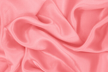 Rose gold fabric texture background, detail of silk or linen pattern.