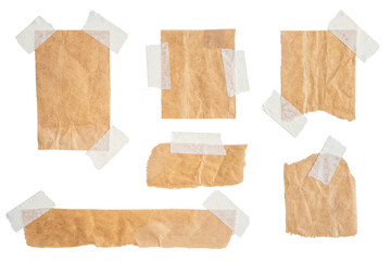 Brown paper labels attached set with sticky tape on white background