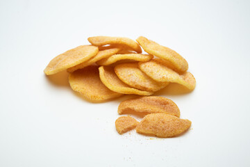 Fresh crunchy prawn crackers with hot spice on white background
