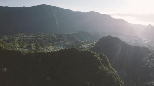 Aerial view of beautiful township among the mountains of Hell Bourg, Saint Benoit, Reunion.