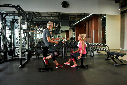 Break time during everyday workouts for elderly man and woman