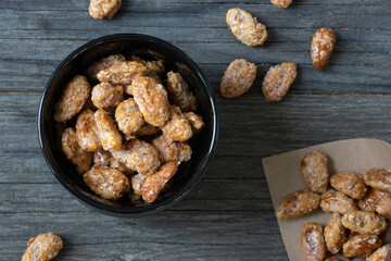 German cinnamon roasted almonds for Christmas in a bowl, close up