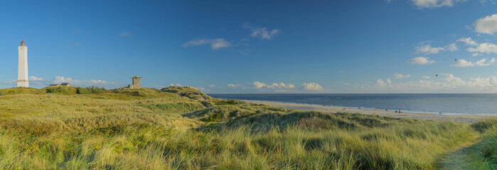 Panorama view of Blåvand lighthouse on wide dune of Blåvandshuk with beach view on the west coast of Jutland, by Esbjerg, Denmark.
 - obrazy, fototapety, plakaty
