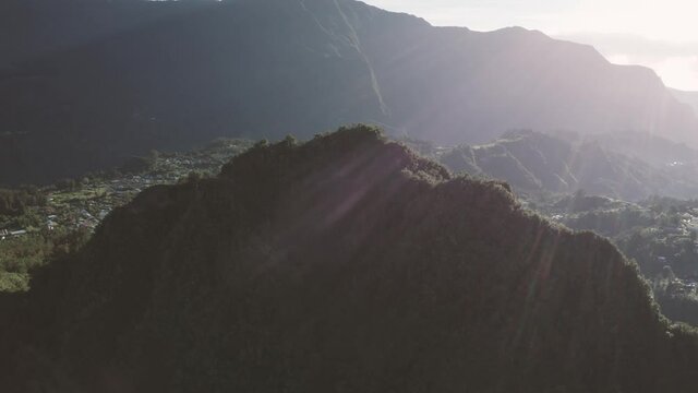 Aerial view of beautiful township among the mountains of Hell Bourg, Saint Benoit, Reunion.