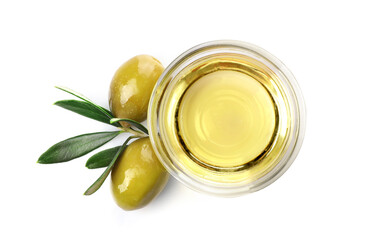 Olive branch and olive oil in a bowl isolated on white. Top view