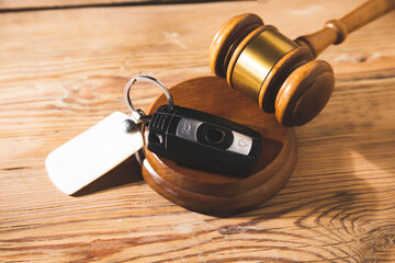 Car auction concept - gavel and car key
