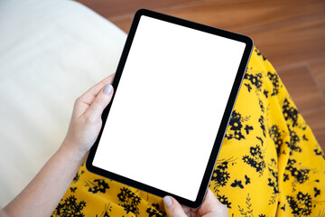 female hands holding computer tablet with isolated screen