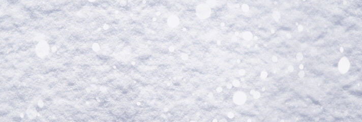 Obraz premium The texture of the snow. Winter rainfall. Tracks on a snowy road after a snowfall.