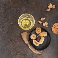 Panellets, typical cookies from Cataluña, prepared for Dia de Todos Los Santos or All Saints Day and traditionally served with sweet wine.Top view