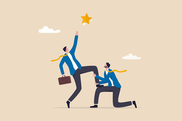 Reach for the star, teamwork or support to achieve business goal, partnership or manager mentorship to help success concept, businessman manager support colleague to stand on his knee to reach target.