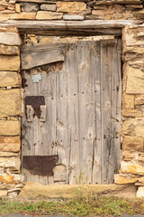 Grunge old wooden front door. 