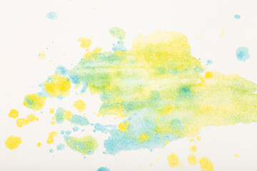 Watercolor background. Colored brush strokes of watercolor paint on white paper.