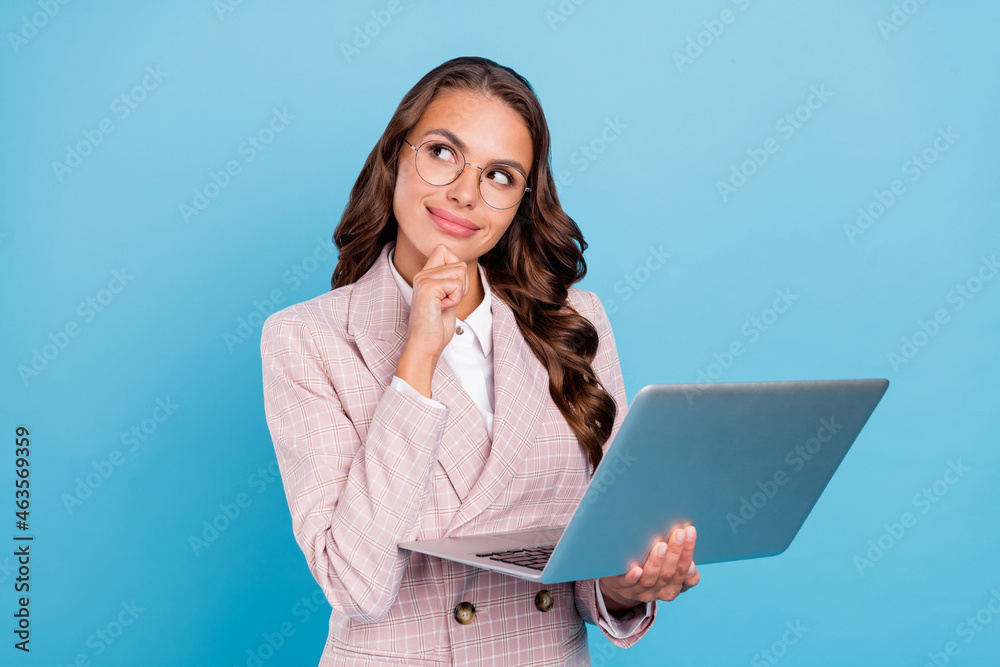 Poster Portrait of attractive cheery smart experienced woman hr expert using laptop overthinking isolated over bright blue color background