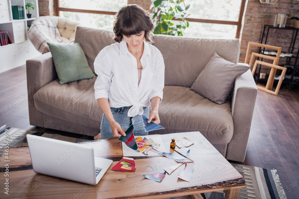 Sticker Photo of cute brunette millennial lady do art wear white shirt sit at home alone