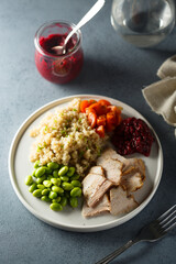 Roasted pork with quinoa and edamame beans